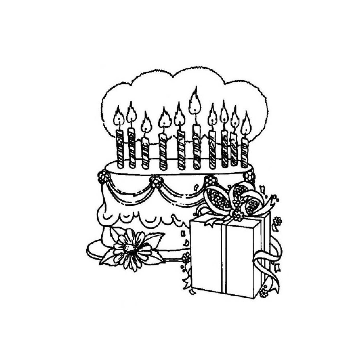   Gâteau d'anniversaire et une boîte cadeau sur une table 
