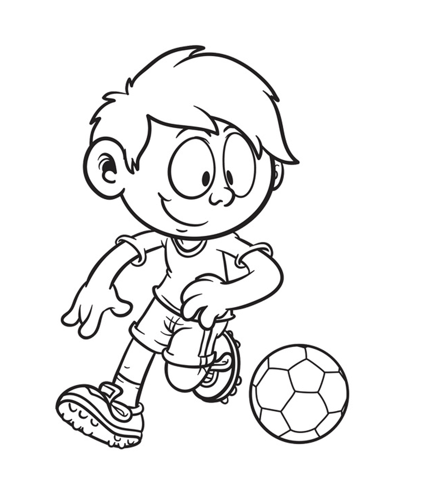   Garçon de 10 ans jouant au foot 