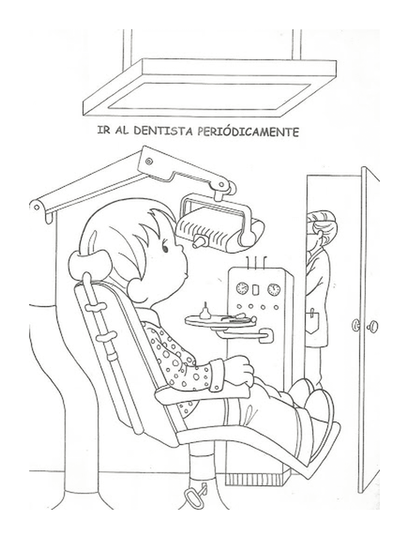   Un enfant assis dans le fauteuil du dentiste 