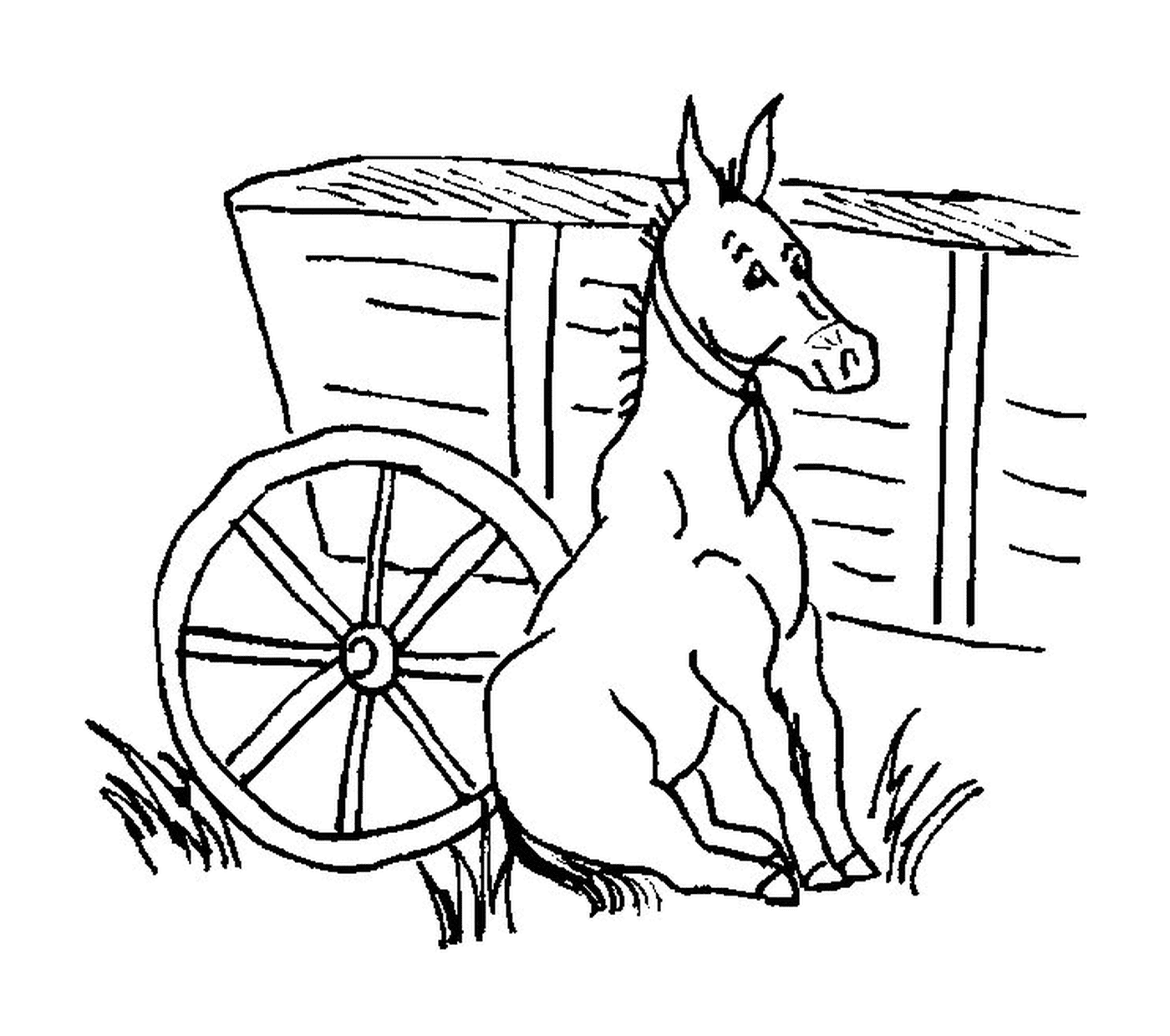   Un âne assis à côté d'une charrette 