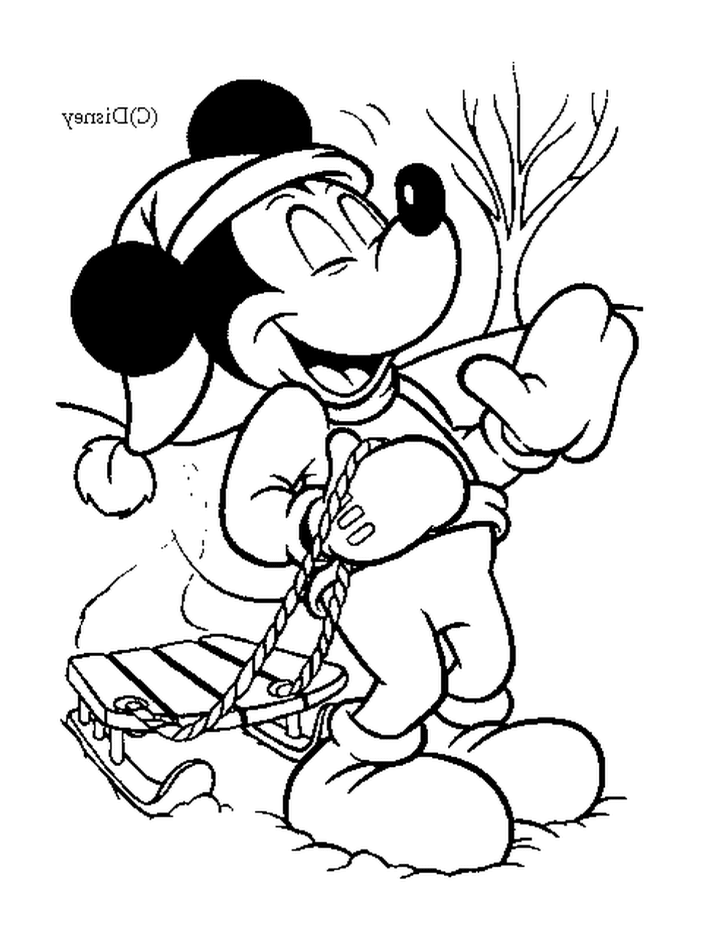 coloriage Mickey tire une luge