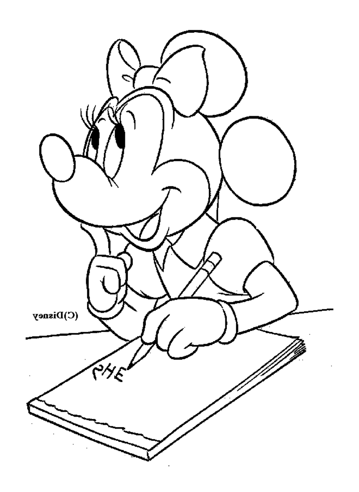 coloriage Minnie ecrit une histoire