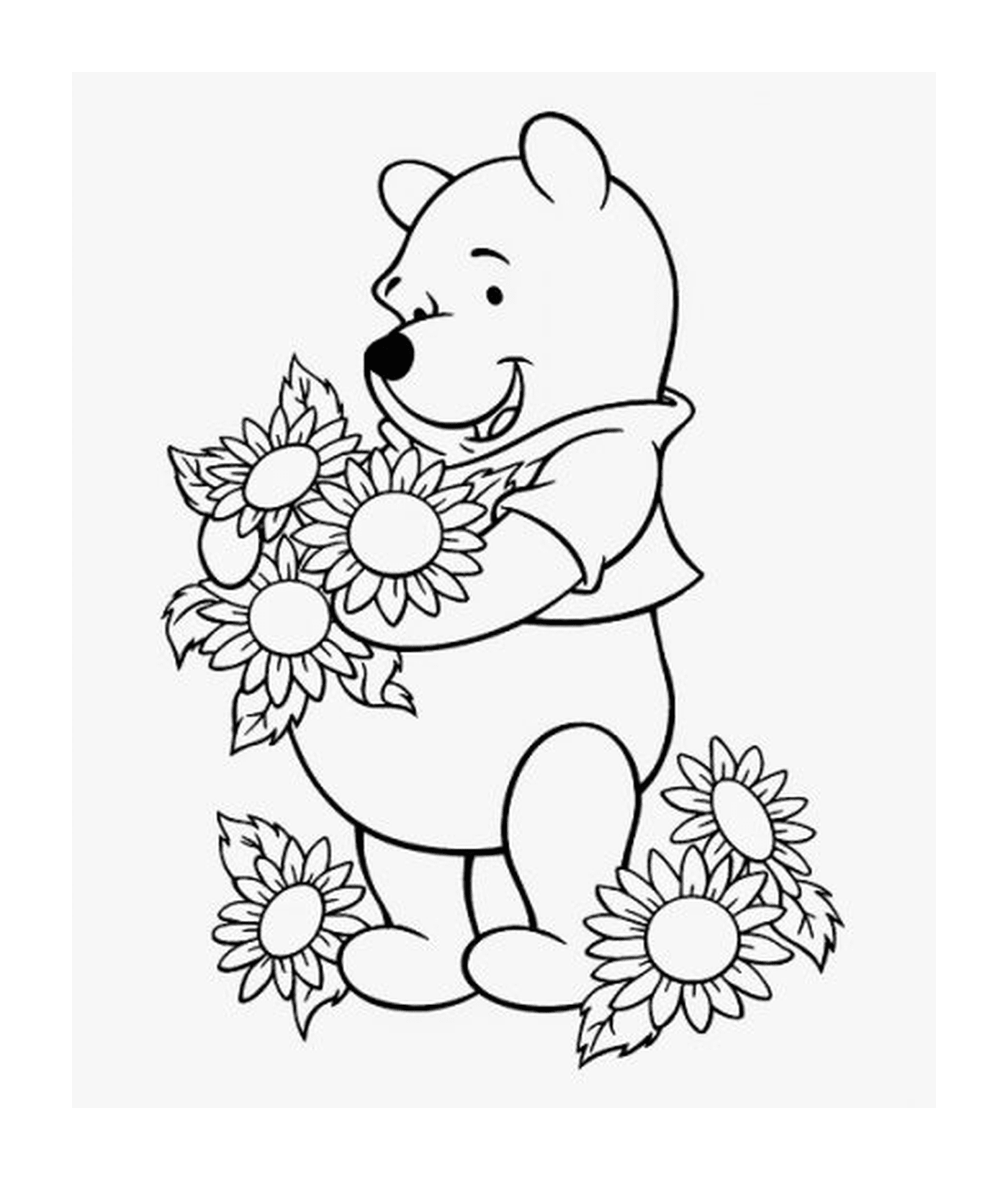 coloriage winnie de pooh aime les fleurs