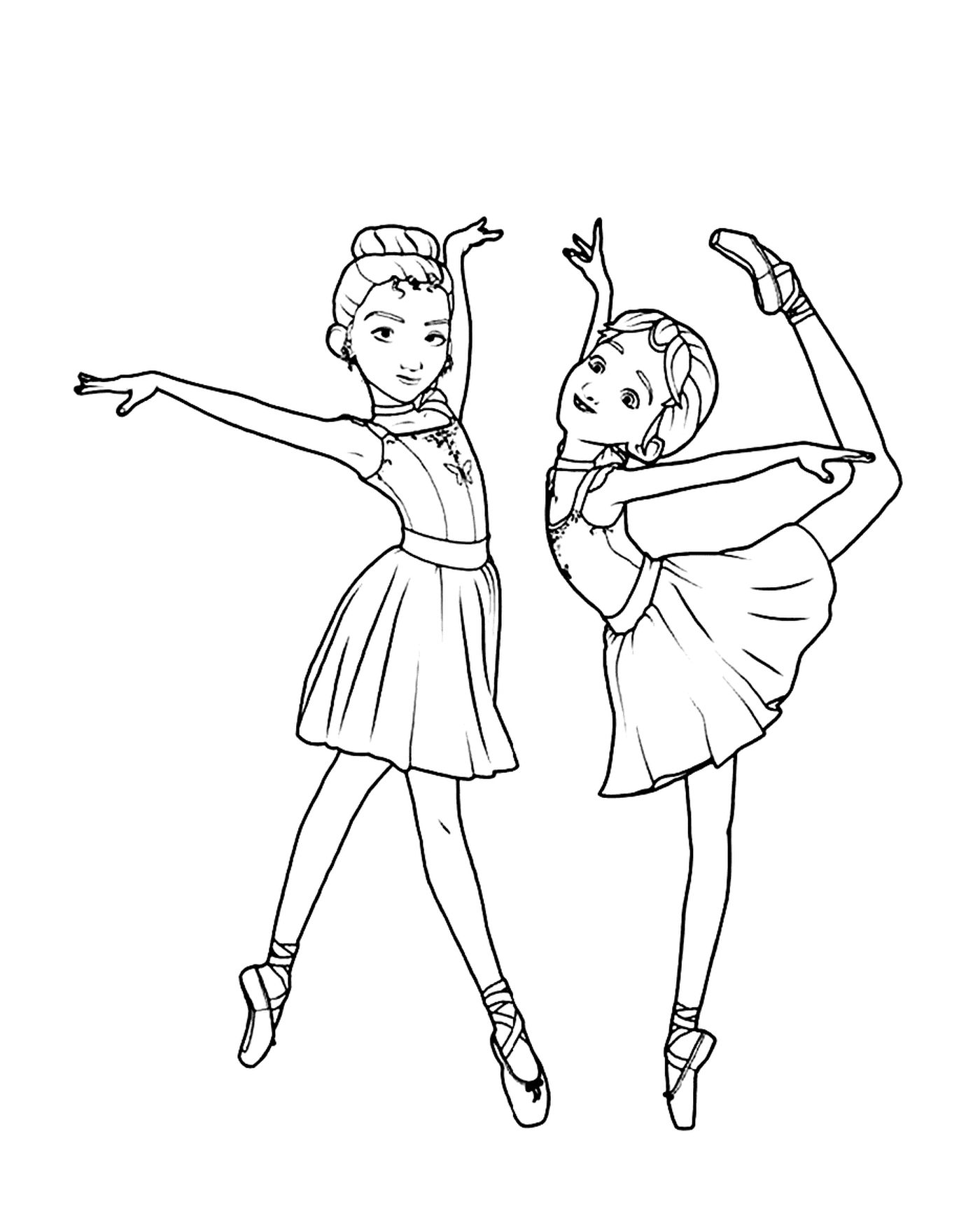   deux jeunes ballerines posent pour une photo 