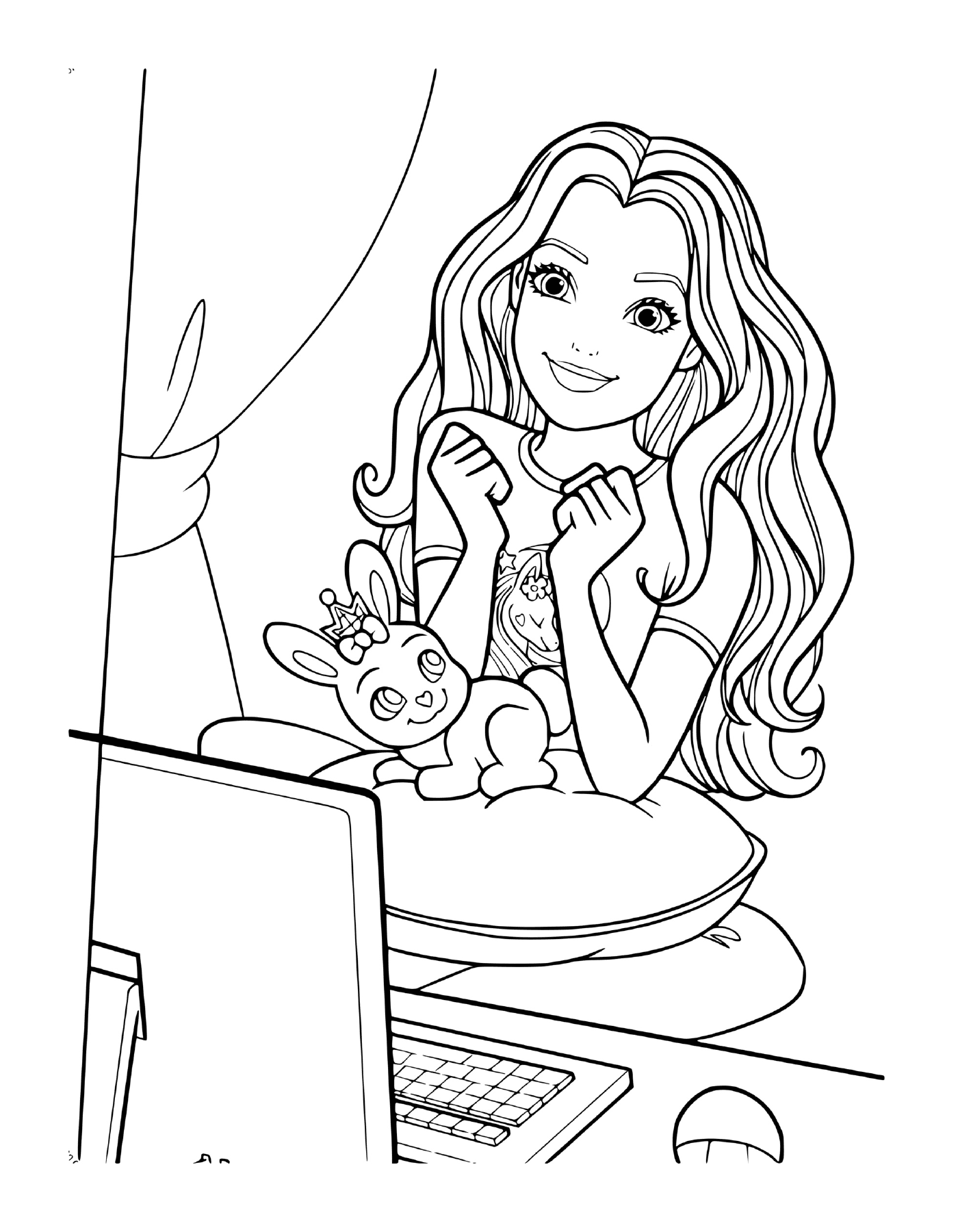   Une jeune fille assise devant un ordinateur 