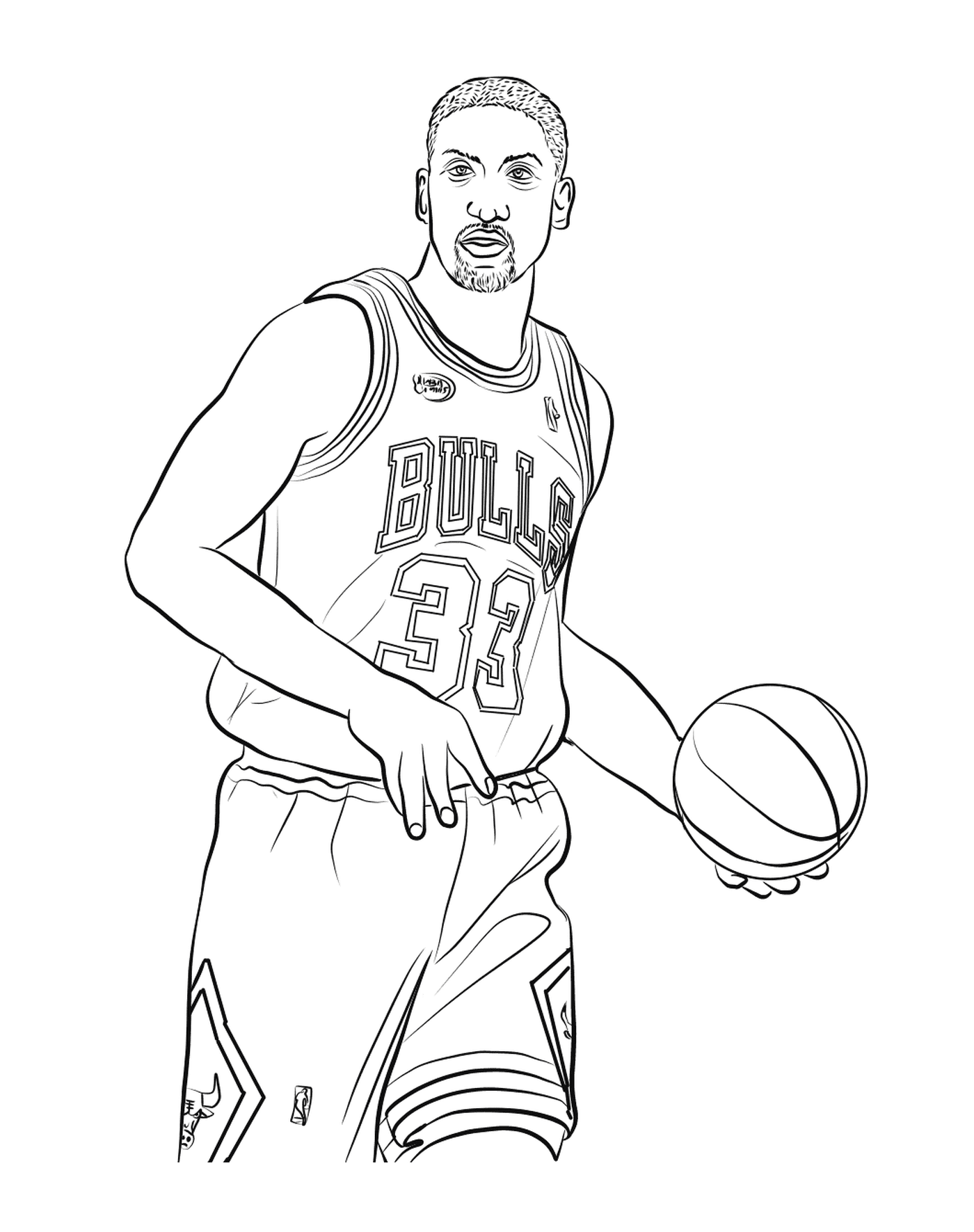   Scottie Pippen tient un ballon de basketball 