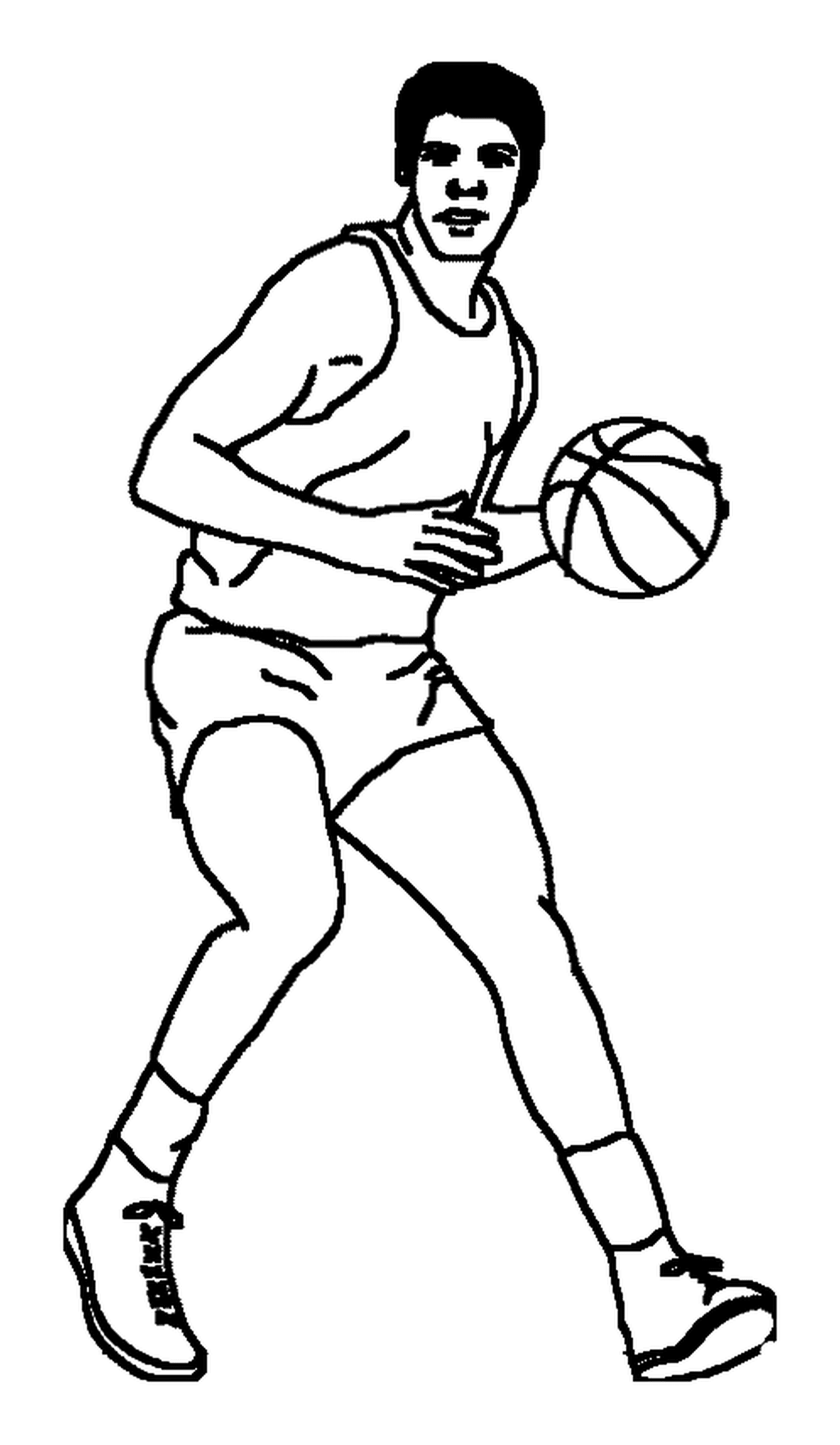   Un joueur de basketball avec un ballon 