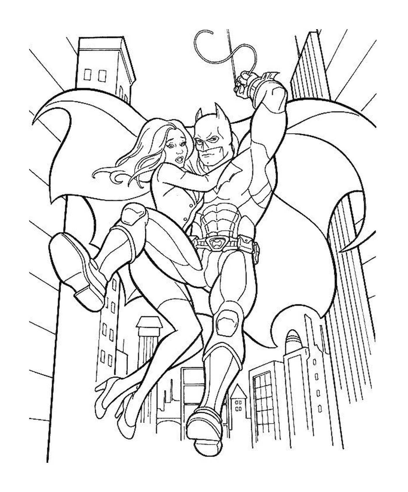   Batman sauve une femme dans la ville 