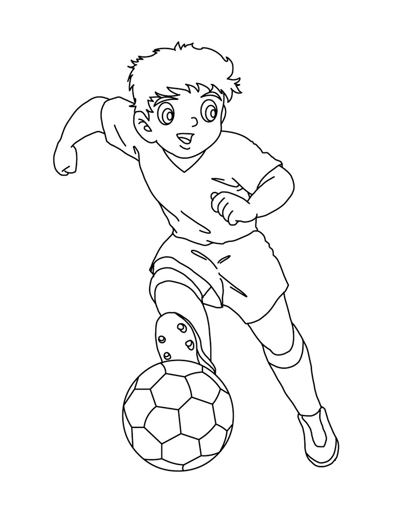   Garçon jouant au foot comme Capitaine Tsubasa 