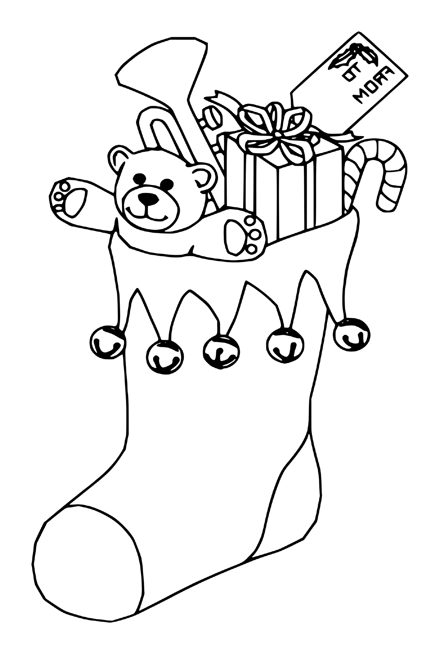   Un ourson en peluche jouant de la trompette dans un bas de Noël 