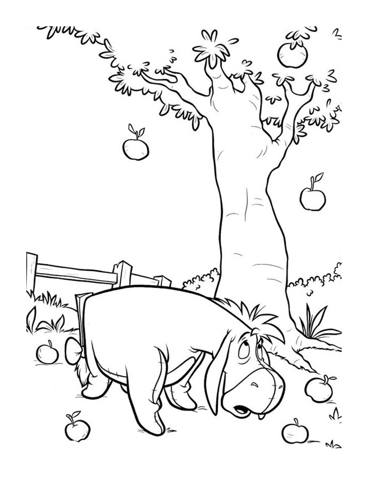  Un hippopotame debout à côté d'un pommier 