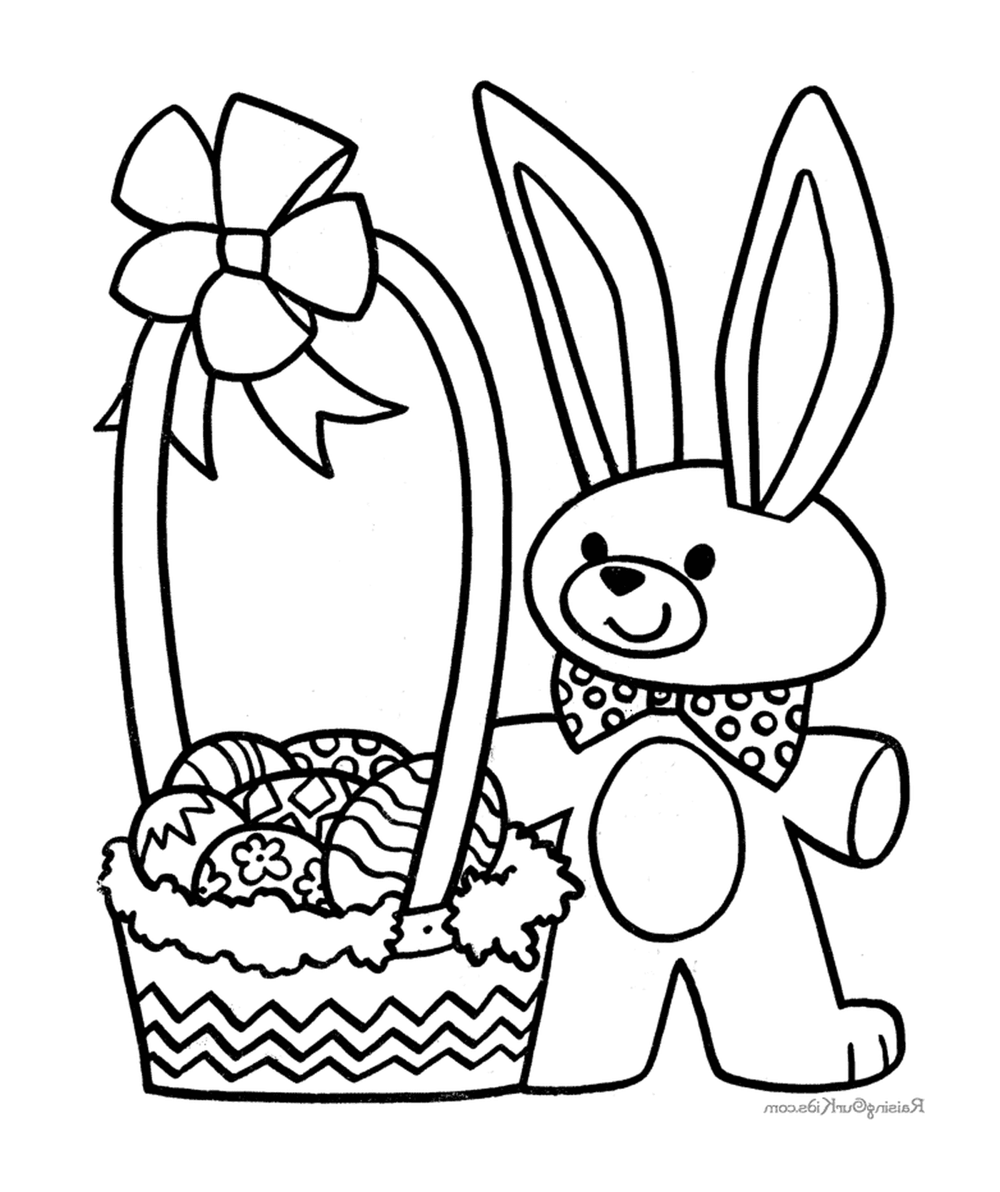   Un lapin de Pâques avec un panier d'œufs 