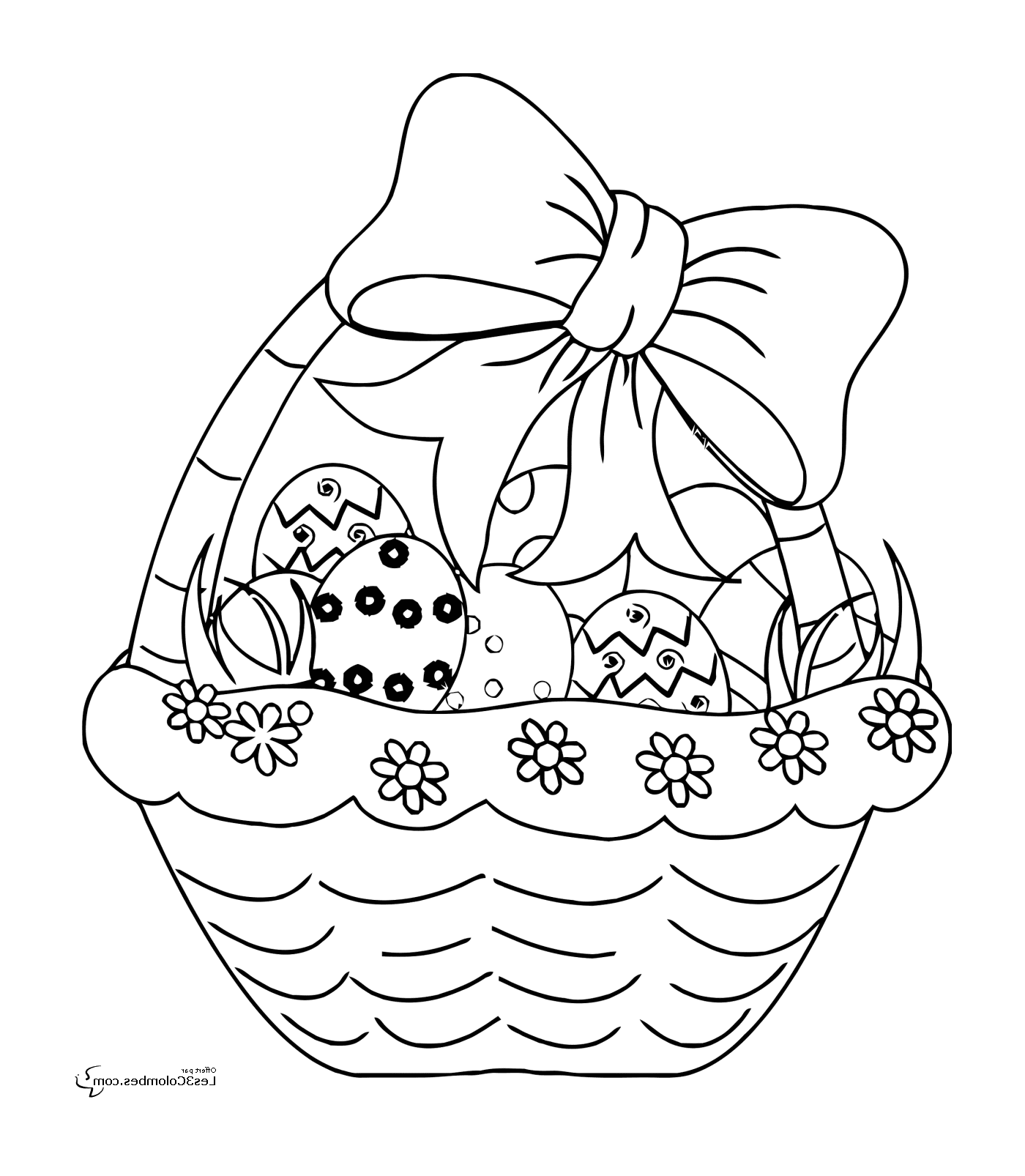   Un panier rempli d'œufs de Pâques avec un nœud 