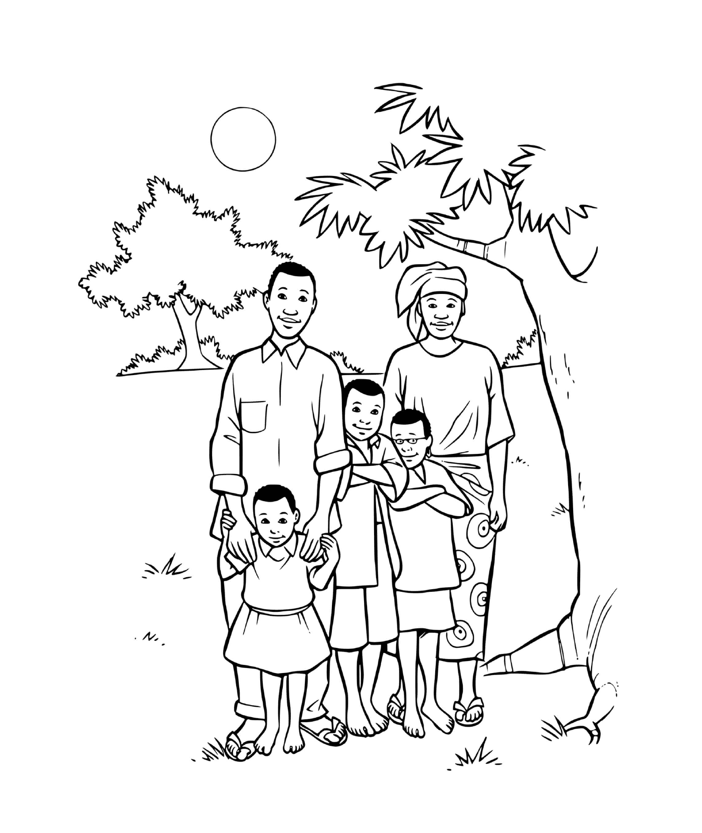   Une famille africaine avec trois enfants sous un arbre 