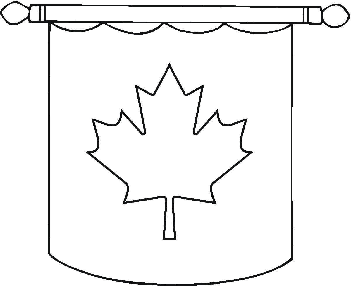   Une feuille d'érable sur un drapeau accroché au mur 