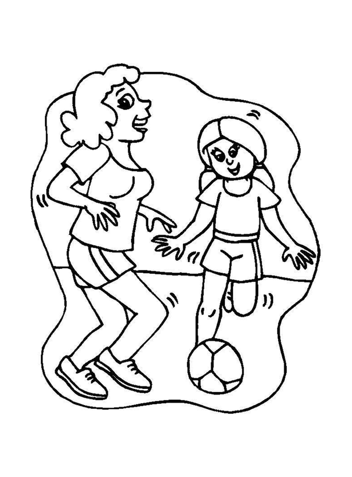   Une maman et sa fille jouent au foot 