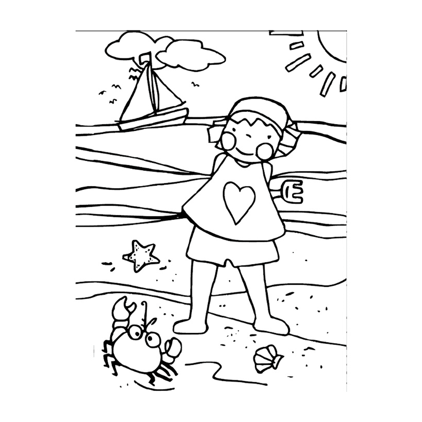   Un enfant debout sur la plage avec un crabe 