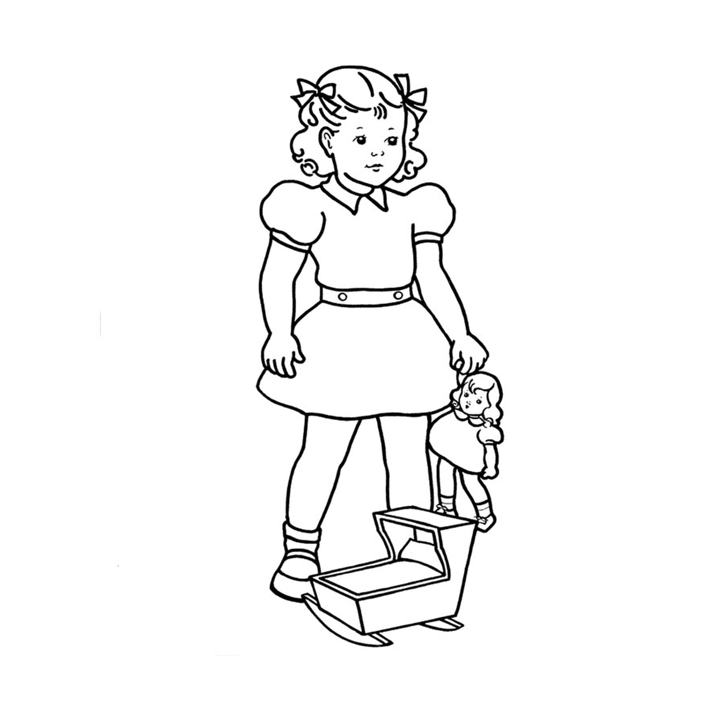   Une petite fille tenant une poupée 