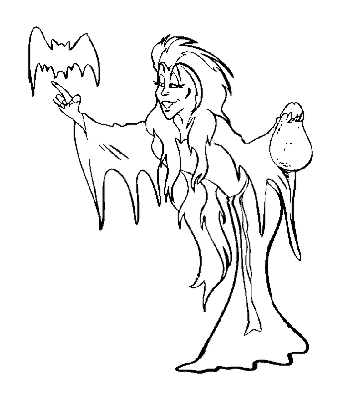   jolie sorcière tenant une chauve-souris 