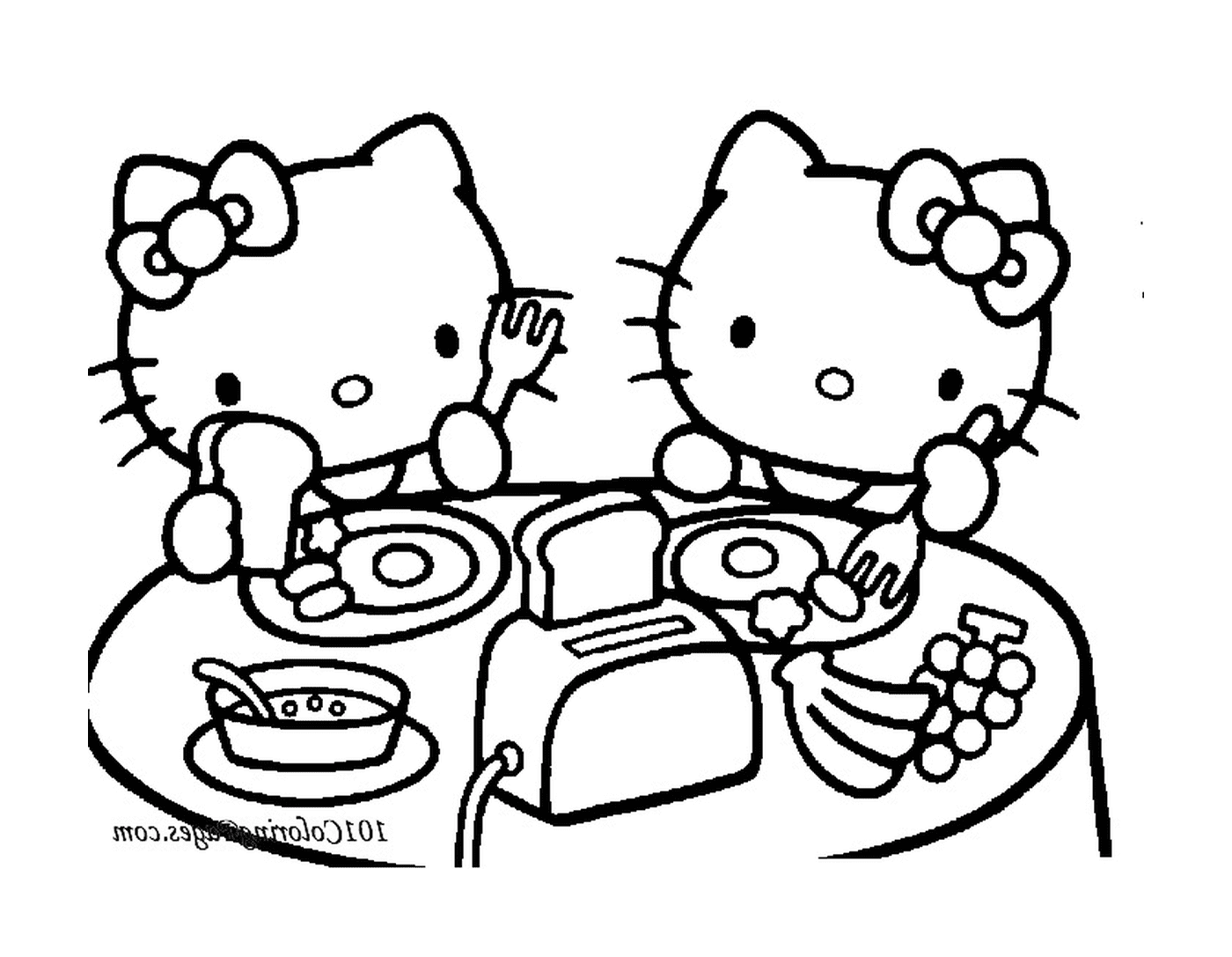   Deux Hello Kitty assises à une table de dîner 