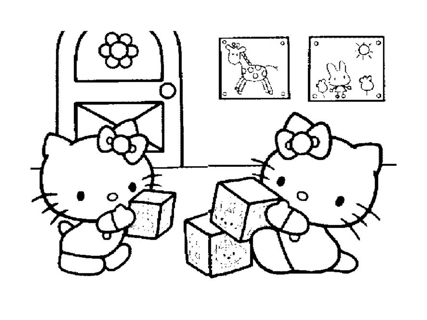   Deux Hello Kitty assises sur des blocs 