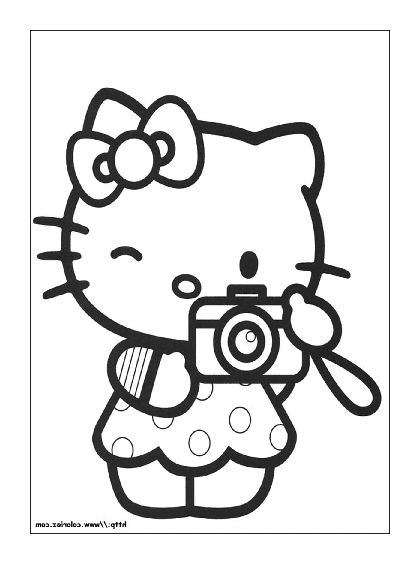   Hello Kitty prenant une photo avec un appareil photo 