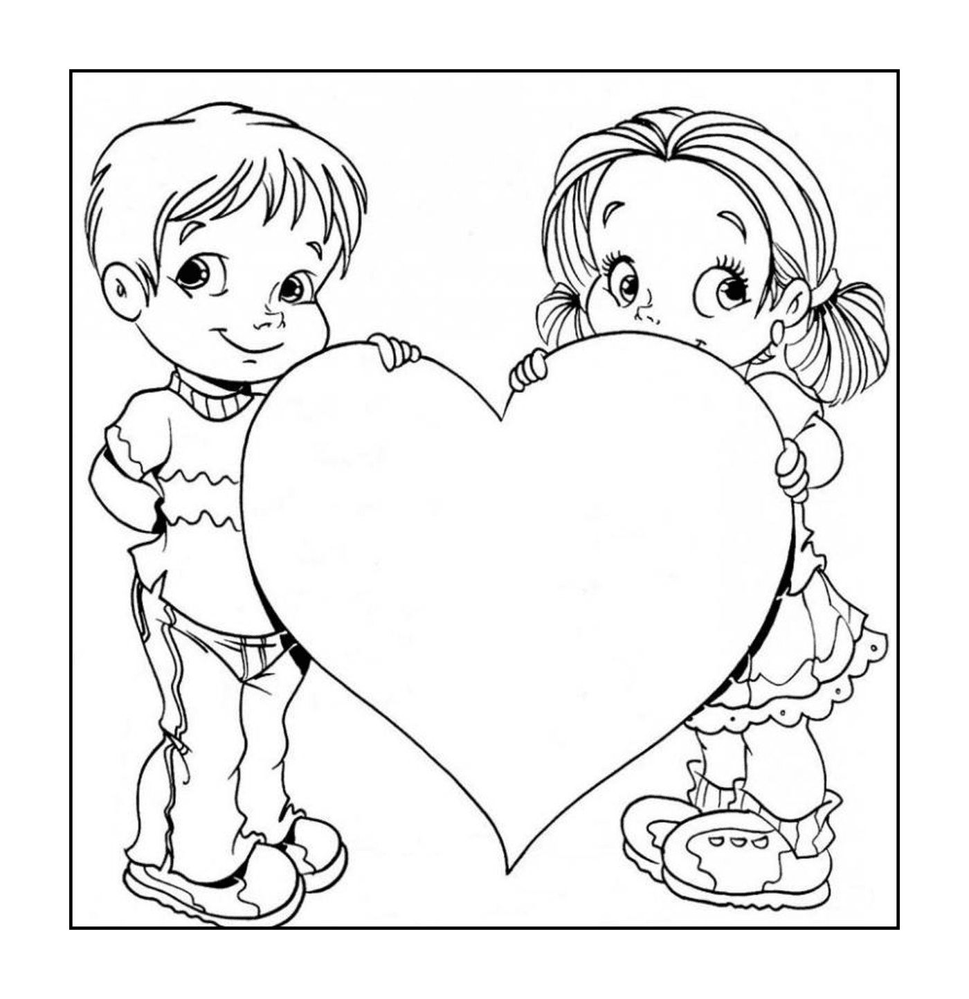   Un garçon et une fille tenant un grand cœur 