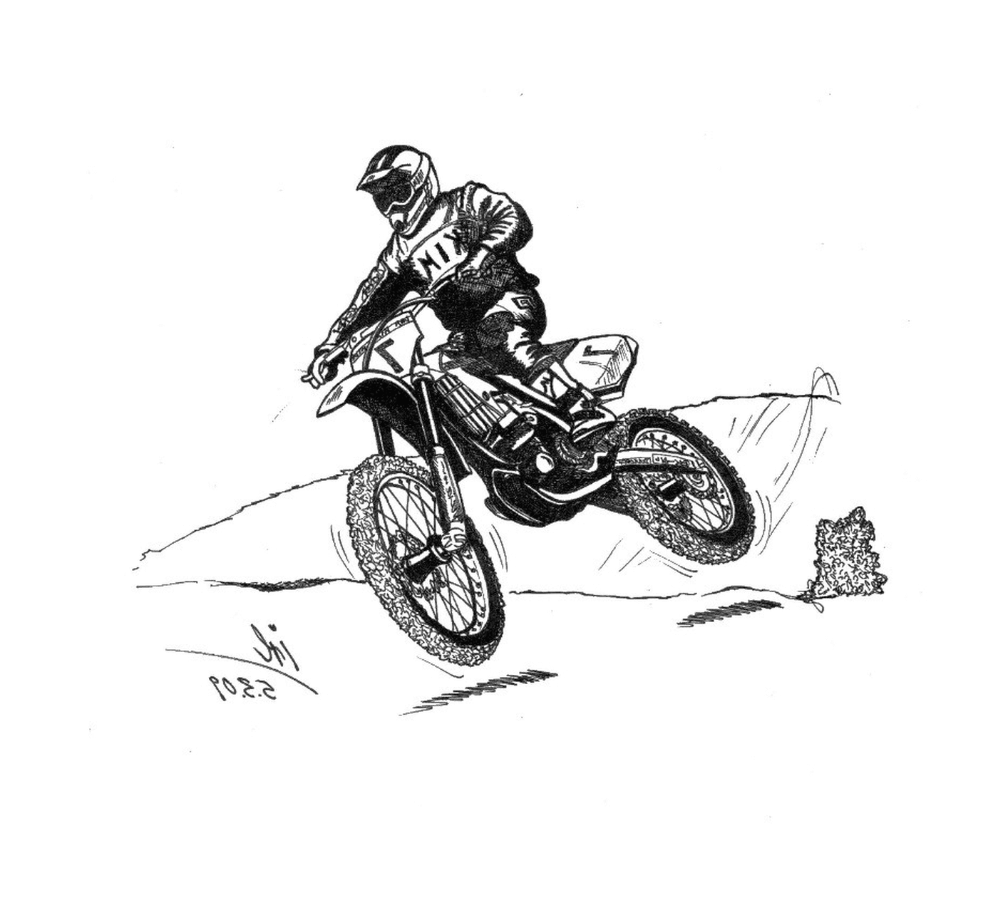   Homme en moto cross sur une colline 