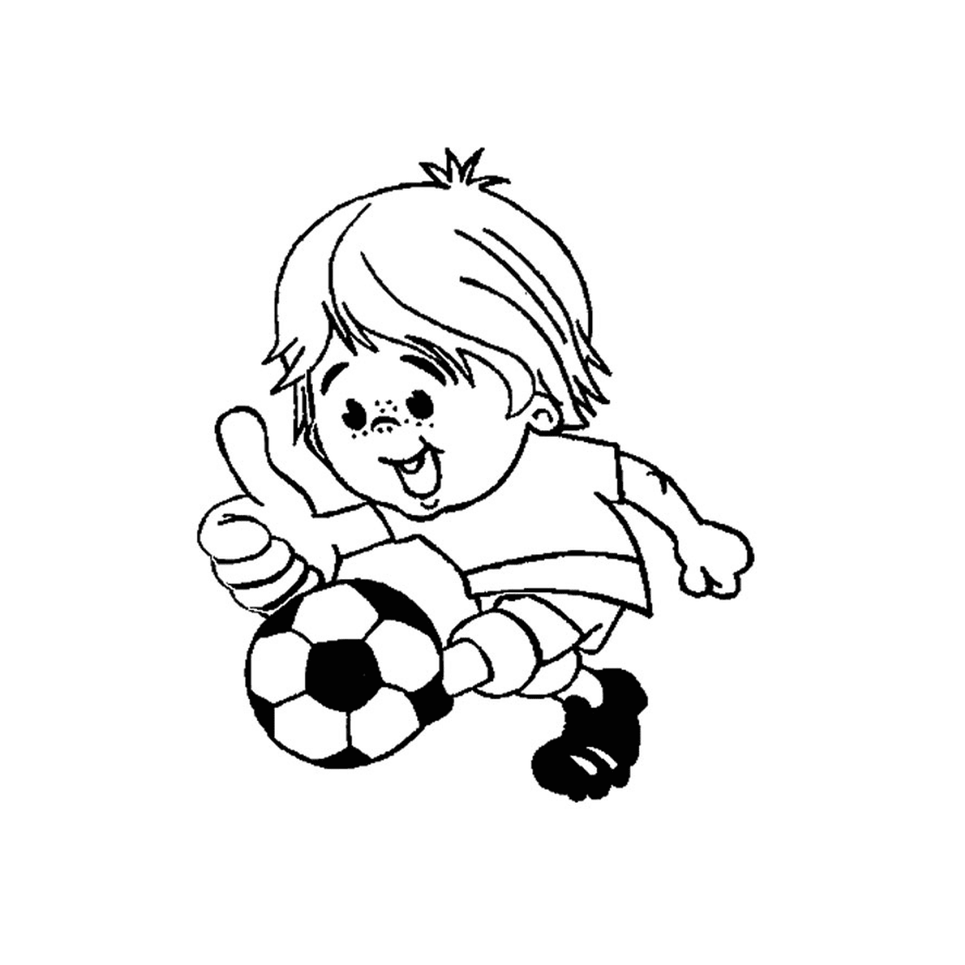   Un garçon joue au football 