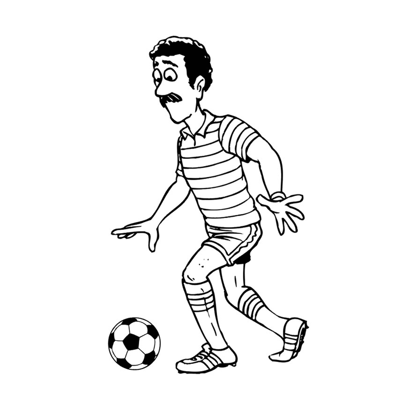   Un homme joue au football en Algérie 