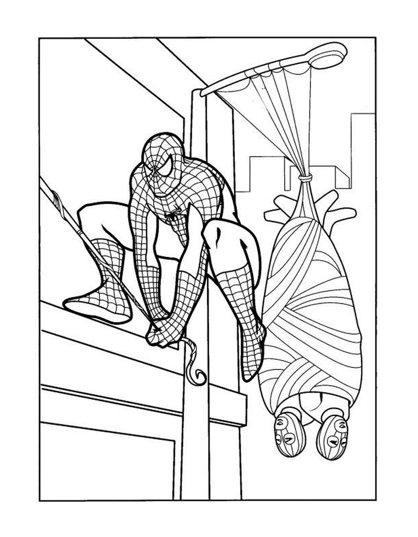   Spiderman escaladant un immeuble 