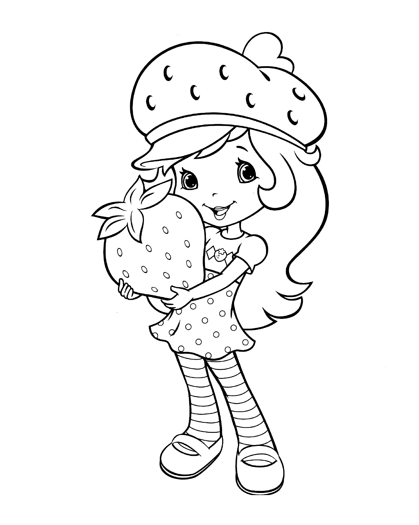   Une fillette tenant une fraise 