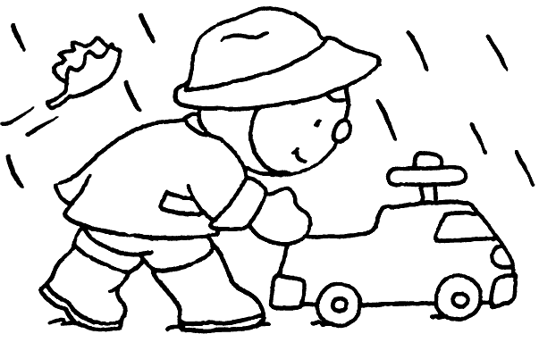   Garçon poussant une voiture jouet 